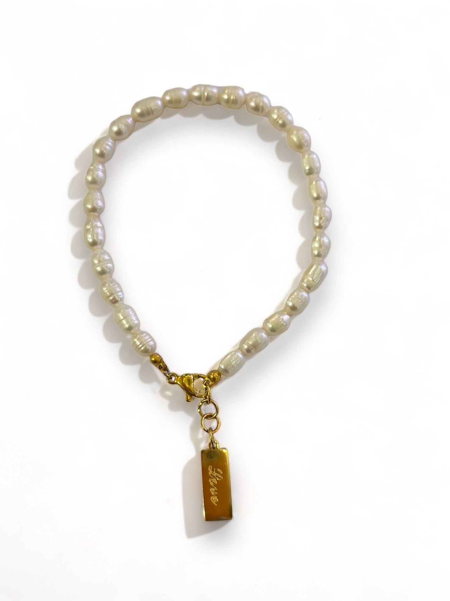 Love/pearl bracelet